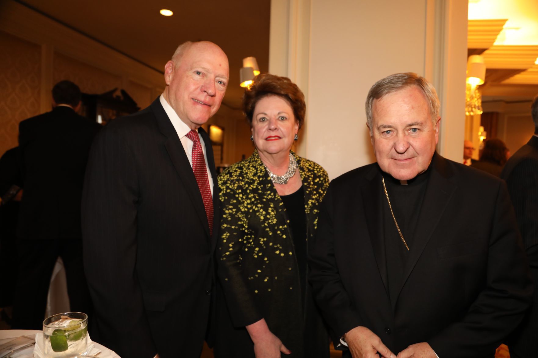 Darryl and Ellen Ross, Archbishop Robert J. Carlson